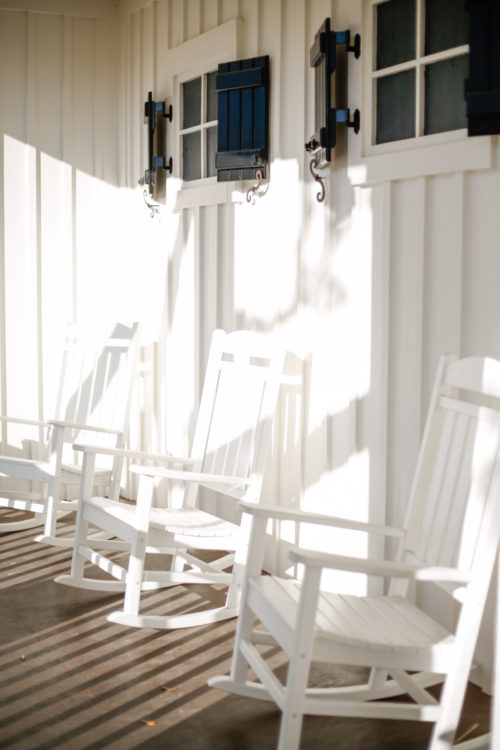 white-rocking-chairs-on-porch