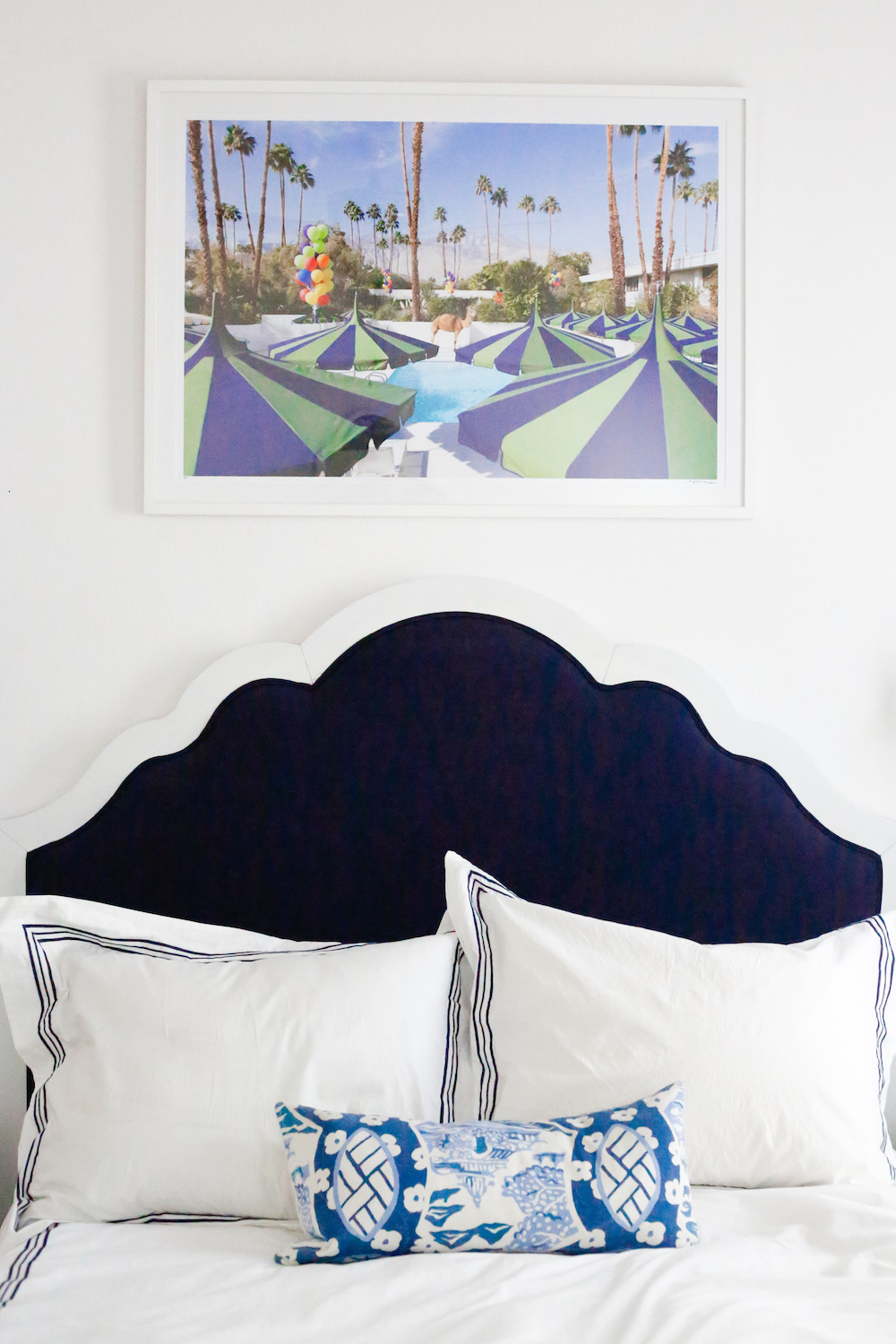 design-darling-dallas-home-tour-guest-bedroom-gray-malin-palm-springs-and-katie-kime-scalloped-headboard