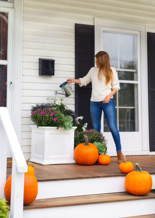 fall porch decor with pumpkins