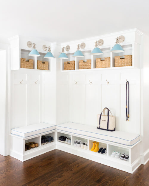 design darling mudroom built-in bench with hudson valley lighting mark d. sikes painted no. 2 sconces in bluebird:polished nickel