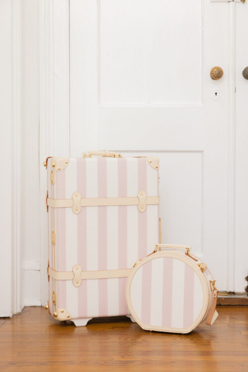 steamline luggage x over the moon illustrator pink stowaway suitcase