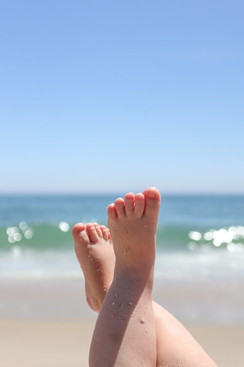 sandy baby feet at the beach design darling